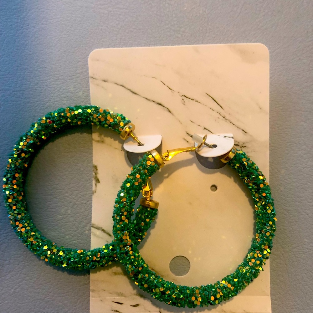 Green sparkly hoop earrings